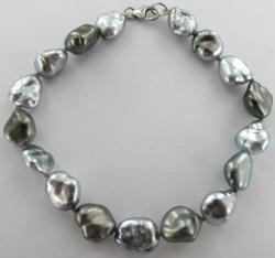 BRACELET OR GRIS 750/00 0.46g MERS DU SUD TAHITI 8/9MM KESHI