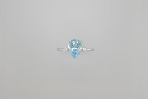 BAGUE OR GRIS 750/00 3.33g 1 TOPAZE BLEUE 2 DIAMANT 0.07CT T54