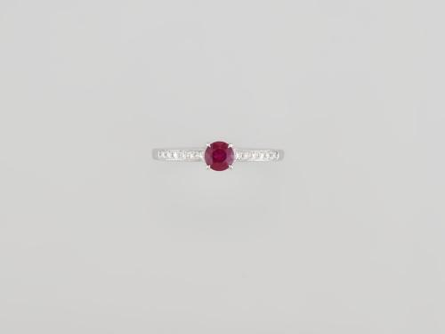 BAGUE OR GRIS 750/00 2.13g 1 RUBIS 0.41CT 12 DIAMANTS 0.07 T54