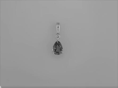 PENDENTIF OR GRIS 750/00 0.65g EMERAUDE 0.59 DIAMANT 0.03