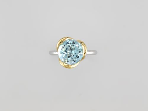 BAGUE OR JAUNE 750/00 1.30g ARGENT 3.36g 1 TOPAZE BLEUE 3.06CT